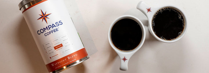 Tin of waypoint with 2 cups of coffee