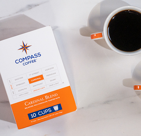 K-cup and cup of coffee cardinal blend